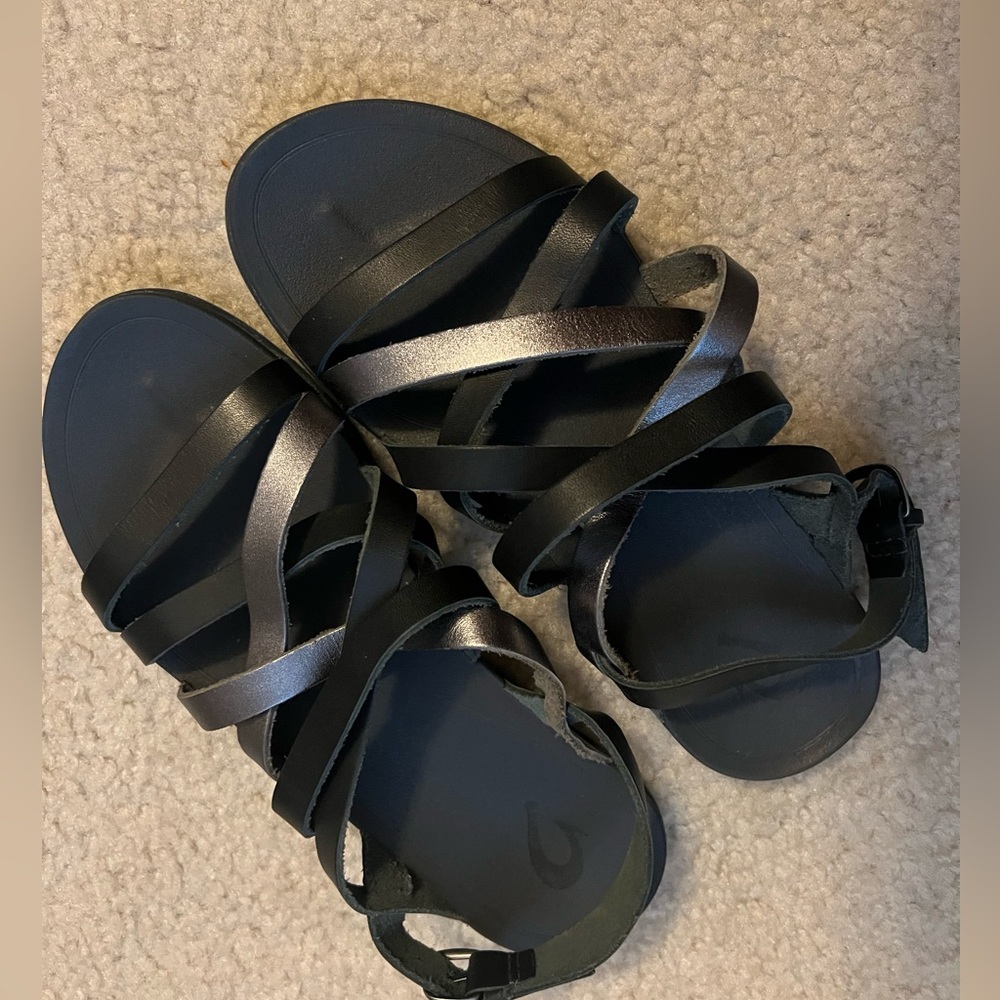 Women’s Olukai Awe Awe Black and Pewter Sandals